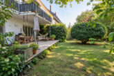 Wohnen mit Garten in HD-Südstadt: 3 ZKB Erdgeschosswohnung mit Terrasse und ca. 200 m² Grün - Garten (KI generiert)